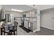 Bright kitchen featuring stainless steel appliances, light-colored cabinets, and neutral countertops at 1108 N Waccamaw Dr. # C-4, Garden City Beach, SC 29576