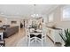 Open-concept design showcases the dining area with a view to the kitchen and living room at 1129 Prescott Circle, Myrtle Beach, SC 29577