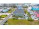 Aerial view of a charming home with a backyard pool, surrounded by lush landscaping and a privacy fence at 113 B Vista Dr., Murrells Inlet, SC 29576