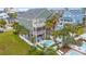 Coastal home with multiple balconies, lush landscaping, and an inviting backyard pool area at 113 B Vista Dr., Murrells Inlet, SC 29576