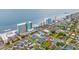 Stunning aerial view of a coastal community with vibrant homes and easy beach access at 113 B Vista Dr., Murrells Inlet, SC 29576