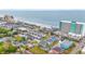 Aerial shot featuring colorful beach homes and hotels with beach access at 113 B Vista Dr., Murrells Inlet, SC 29576