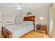 Inviting bedroom featuring hardwood floors, queen bed, and nautical decorative accents at 113 B Vista Dr., Murrells Inlet, SC 29576