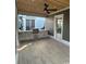Covered outdoor patio with custom grill and tile flooring perfect for entertaining and relaxing at 1348 Rue De Jean Ave., Myrtle Beach, SC 29579