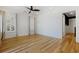 Open bedroom space with wood floors, recessed lights and shuttered windows at 1359 Peterson St., Myrtle Beach, SC 29577
