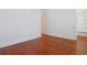 Bedroom with hardwood floors and open doorway to ensuite closet at 1359 Peterson St., Myrtle Beach, SC 29577