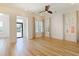 Open bedroom space with wood floors, recessed lights and shuttered windows at 1359 Peterson St., Myrtle Beach, SC 29577
