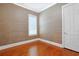 Bedroom with wallpapered walls and hardwood floors at 1359 Peterson St., Myrtle Beach, SC 29577
