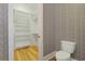 Walk-in closet with custom shelving, hardwood floors and designer wallpaper at 1359 Peterson St., Myrtle Beach, SC 29577