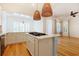 Modern kitchen with stainless appliances, island and wood floors at 1359 Peterson St., Myrtle Beach, SC 29577