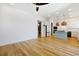 Bright living room with wood floors and a seamless open floor plan to kitchen at 1359 Peterson St., Myrtle Beach, SC 29577