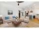 Bright living room with wood floors and a seamless open floor plan to kitchen at 1359 Peterson St., Myrtle Beach, SC 29577