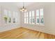 Bright room featuring plantation shutters, shiplap accent wall, and gorgeous hardwood floors at 1359 Peterson St., Myrtle Beach, SC 29577