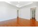 Bright room with hardwood floors, a ceiling fan and an attached closet at 1359 Peterson St., Myrtle Beach, SC 29577