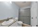 Bathroom with blue walls, light countertops, shower, and tile flooring at 1361 Turkey Ridge Rd. # C, Surfside Beach, SC 29575