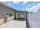 The backyard patio has a paved area and a white fence to ensure privacy at 1361 Turkey Ridge Rd. # C, Surfside Beach, SC 29575