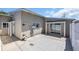 The backyard patio features concrete pavers and a sliding glass door that provides access to the home's interior at 1361 Turkey Ridge Rd. # C, Surfside Beach, SC 29575
