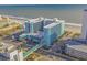 Aerial view of the Landmark Resort by the beach, showcasing its sprawling layout, pool, and surrounding area at 1501 S Ocean Blvd. # 320, Myrtle Beach, SC 29577