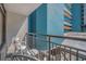 Outdoor balcony featuring metal railings and seating; views of surrounding buildings at 1501 S Ocean Blvd. # 320, Myrtle Beach, SC 29577