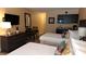Inviting bedroom area with a kitchenette, table with chairs, and TV at 1501 S Ocean Blvd. # 320, Myrtle Beach, SC 29577