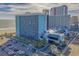 Exterior view of Landmark Resort, showing ocean views, pool, and parking at 1501 S Ocean Blvd. # 320, Myrtle Beach, SC 29577