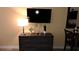 Living area features a dresser with a TV at 1501 S Ocean Blvd. # 320, Myrtle Beach, SC 29577