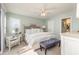 Tranquil bedroom featuring a luxurious bed, soft lighting, and a cozy seating area at 1608 Harbor Dr., North Myrtle Beach, SC 29582