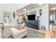 Open-concept living room showcasing views into the dining area and stylish decor accents at 1608 Harbor Dr., North Myrtle Beach, SC 29582