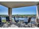 Relaxing balcony view with seating overlooking a serene waterway at 2151 Bridge View Ct. # 2-803, North Myrtle Beach, SC 29582