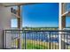 Balcony overlooking a body of water and buildings in the distance under a clear blue sky at 2151 Bridge View Ct. # 2-803, North Myrtle Beach, SC 29582