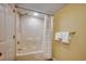 Clean bathroom with a white tub and shower combination and neutral accents at 2151 Bridge View Ct. # 2-803, North Myrtle Beach, SC 29582