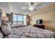 Bedroom featuring two beds, soft lighting, and a view to the outdoor balcony at 2151 Bridge View Ct. # 2-803, North Myrtle Beach, SC 29582