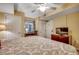 A comfortable bedroom with a desk, closet, and TV at 2151 Bridge View Ct. # 2-803, North Myrtle Beach, SC 29582