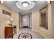 Inviting foyer features neutral walls, elegant tile flooring with a compass design, and decorative furnishings at 2151 Bridge View Ct. # 2-803, North Myrtle Beach, SC 29582