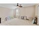 Spacious bedroom with a window, artwork, and neutral color scheme at 2446 Craven Dr., Myrtle Beach, SC 29572