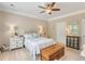 Comfortable bedroom featuring neutral colors, a ceiling fan and ample closet space at 2446 Craven Dr., Myrtle Beach, SC 29572