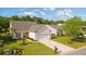 Well maintained single Gathering home with a manicured lawn and landscaping, including palm trees, plus an attached two-car garage at 2446 Craven Dr., Myrtle Beach, SC 29572