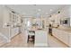 Spacious kitchen featuring a large island with seating, stainless steel appliances, and elegant pendant lighting at 2446 Craven Dr., Myrtle Beach, SC 29572