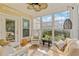 Cozy sunroom filled with natural light, perfect for relaxation and enjoying the outdoors at 2446 Craven Dr., Myrtle Beach, SC 29572