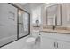 Bright bathroom featuring shower over bath, granite countertops and modern vanity at 25 Northwoods Ct., Pawleys Island, SC 29585