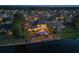Aerial view of waterfront home with pool, outdoor kitchen, and private boat dock in a gated community at 256 Shoreward Dr., Myrtle Beach, SC 29579