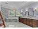 This spa bathroom features double sinks, soaking tub and decorative mosaic tile accents at 256 Shoreward Dr., Myrtle Beach, SC 29579