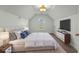Cozy bedroom features a modern design with a large window and stylish décor, providing comfort at 256 Shoreward Dr., Myrtle Beach, SC 29579