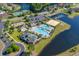 Aerial view of the community pool, clubhouse, playground, and beach volleyball area at 256 Shoreward Dr., Myrtle Beach, SC 29579