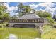 Community entrance sign for Plantation Lakes with a tiered fountain and lush landscaping at 256 Shoreward Dr., Myrtle Beach, SC 29579