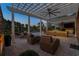 Covered outdoor kitchen and patio with a view of the pool and waterfront at 256 Shoreward Dr., Myrtle Beach, SC 29579