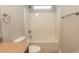 Bathroom featuring a shower-tub combo and granite-topped vanity at 2600 Henagan Ln., Myrtle Beach, SC 29588