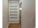 Hallway with hardwood floors and a built in bookcase at 2600 Henagan Ln., Myrtle Beach, SC 29588
