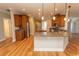 Spacious kitchen with granite countertops, stainless steel appliances, hardwood floors, and an island with sink at 2600 Henagan Ln., Myrtle Beach, SC 29588
