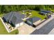 Estate aerial view, showing lush landscaping, garages, a pool and additional buildings and ample parking at 2767 Lees Landing Circle, Conway, SC 29526